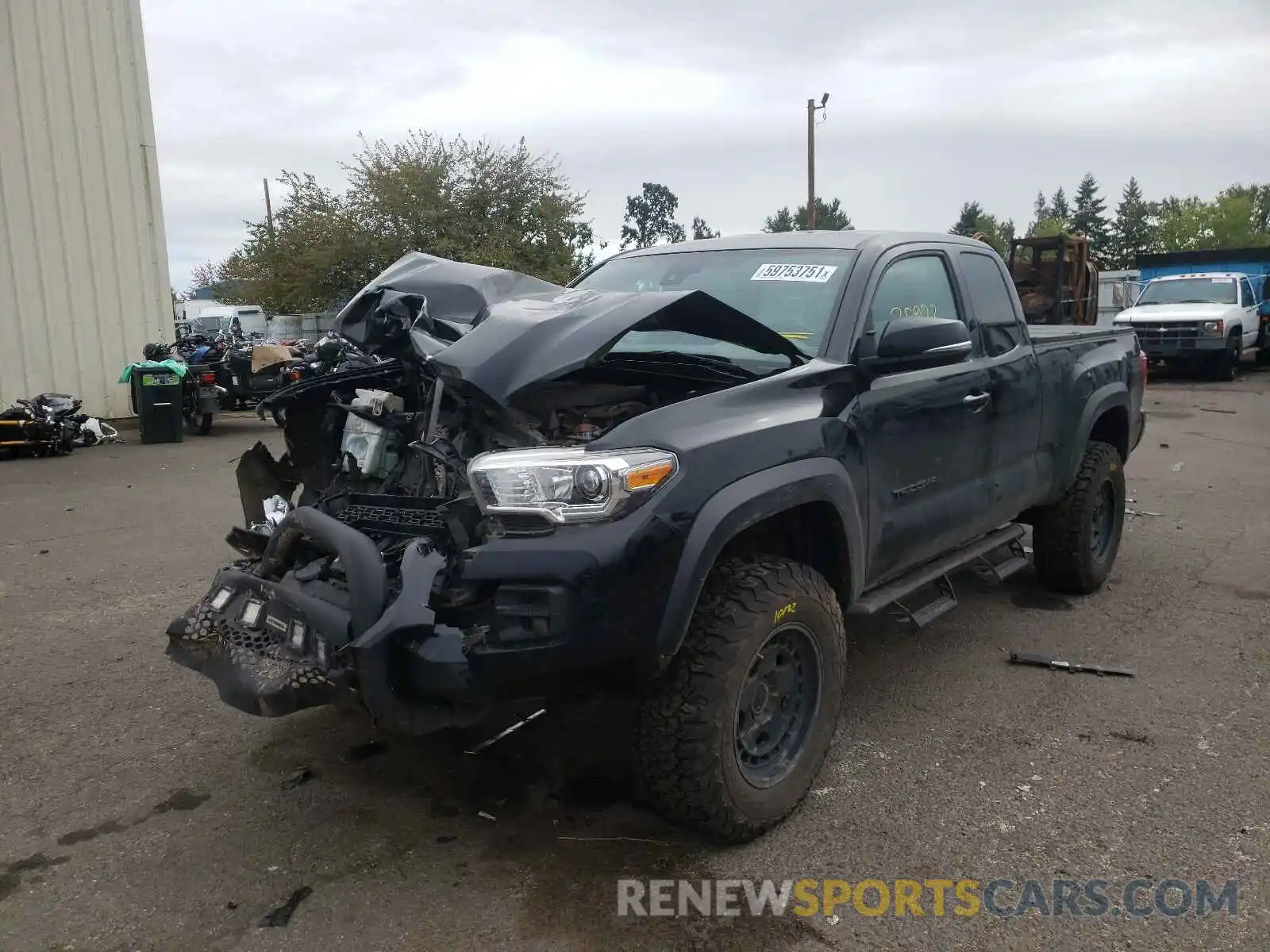 2 Photograph of a damaged car 5TFSZ5AN9KX191448 TOYOTA TACOMA 2019