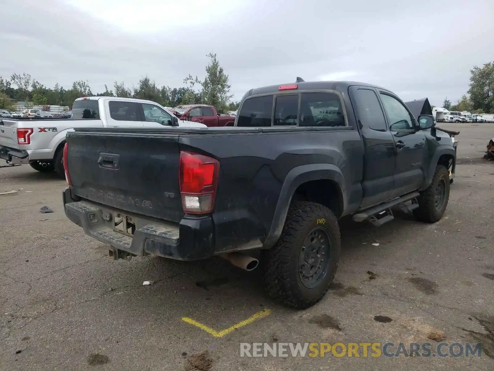 4 Photograph of a damaged car 5TFSZ5AN9KX191448 TOYOTA TACOMA 2019