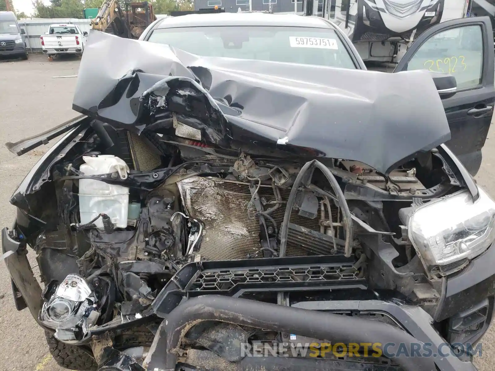 7 Photograph of a damaged car 5TFSZ5AN9KX191448 TOYOTA TACOMA 2019