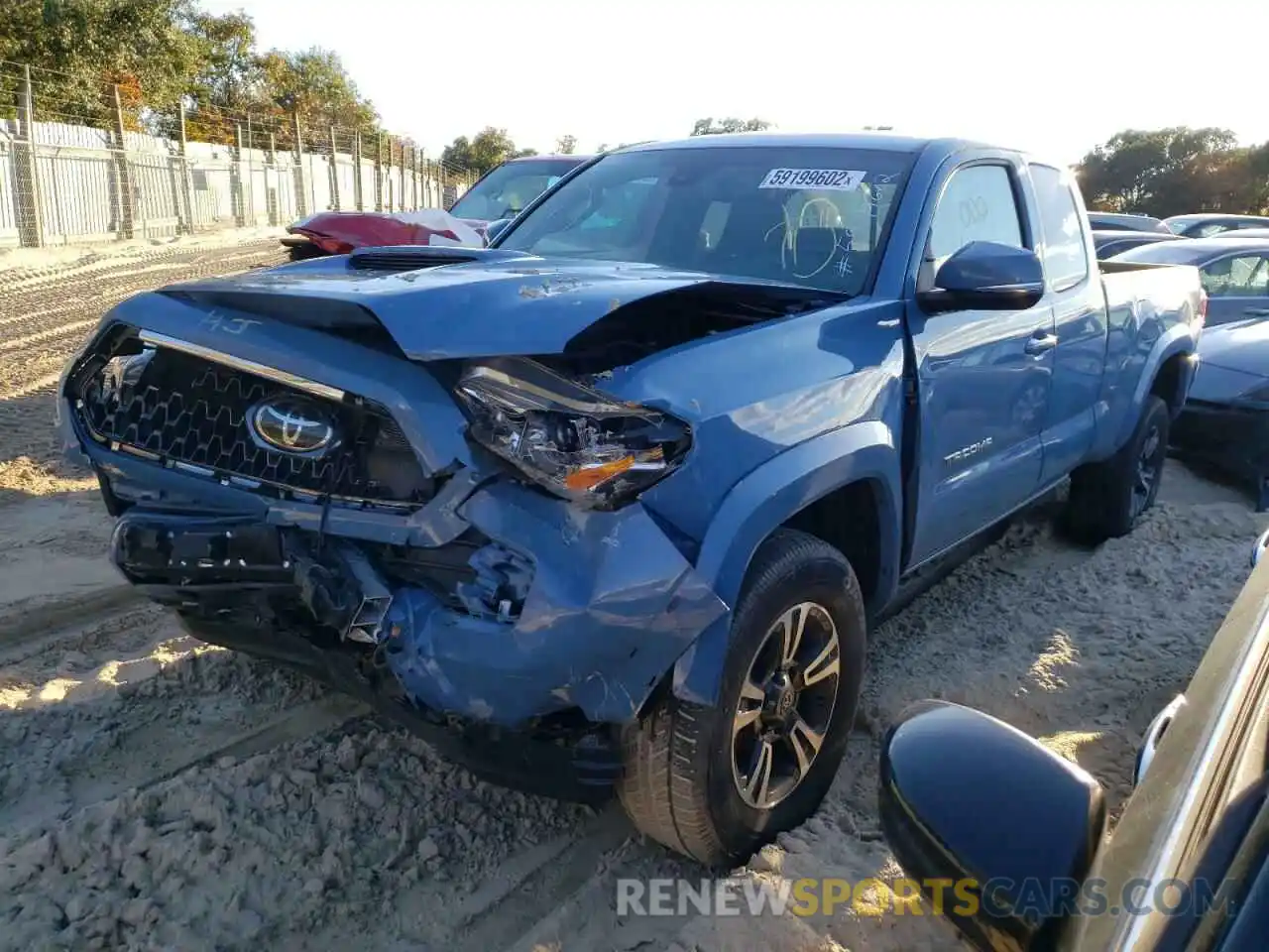 2 Photograph of a damaged car 5TFSZ5AN9KX210466 TOYOTA TACOMA 2019