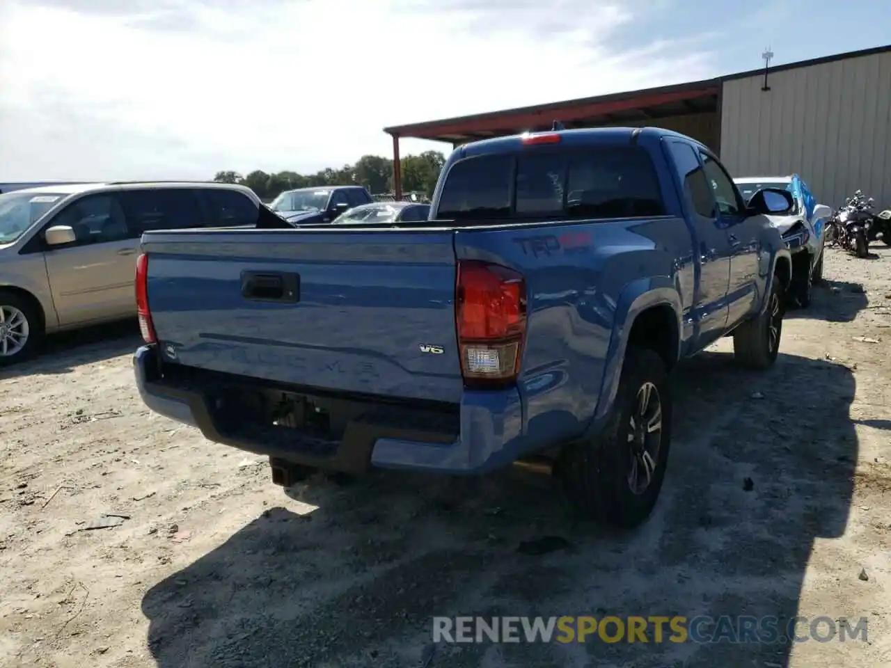 4 Photograph of a damaged car 5TFSZ5AN9KX210466 TOYOTA TACOMA 2019