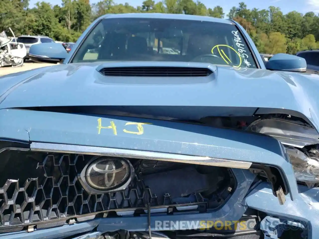 7 Photograph of a damaged car 5TFSZ5AN9KX210466 TOYOTA TACOMA 2019