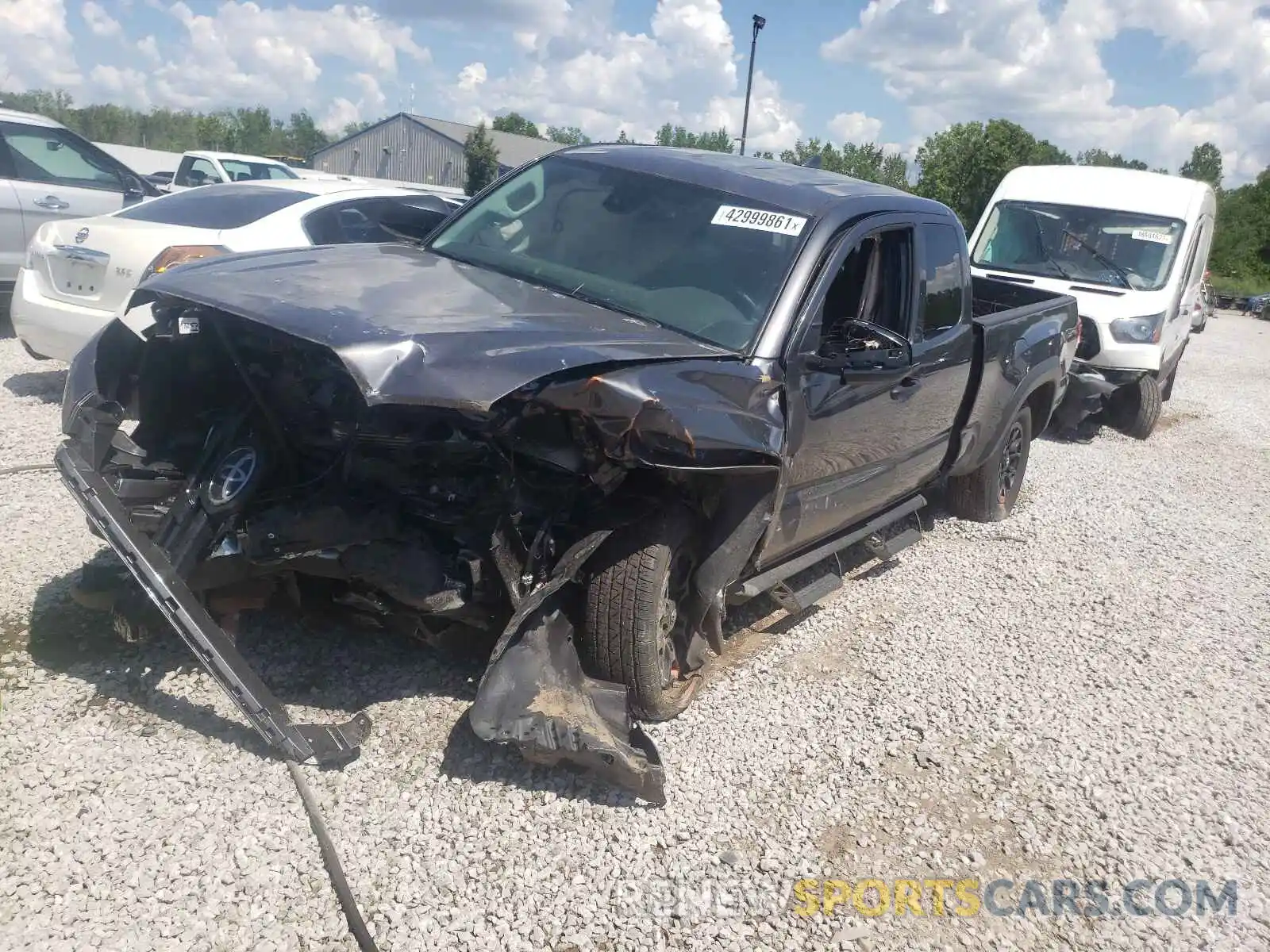 2 Photograph of a damaged car 5TFSZ5AN9KX210872 TOYOTA TACOMA 2019