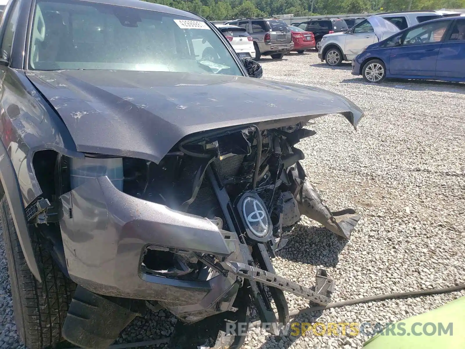 9 Photograph of a damaged car 5TFSZ5AN9KX210872 TOYOTA TACOMA 2019