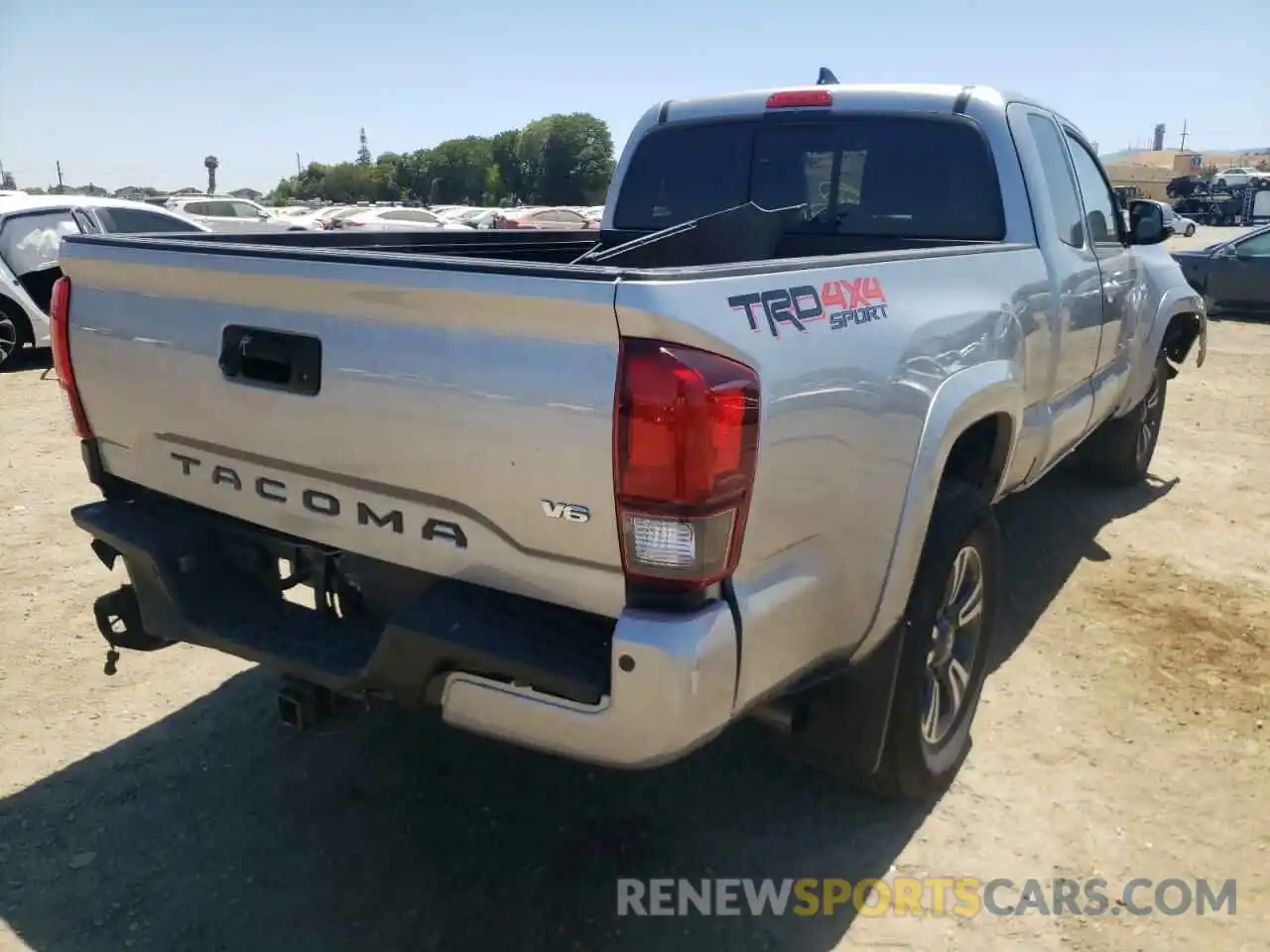 4 Photograph of a damaged car 5TFSZ5ANXKX171032 TOYOTA TACOMA 2019