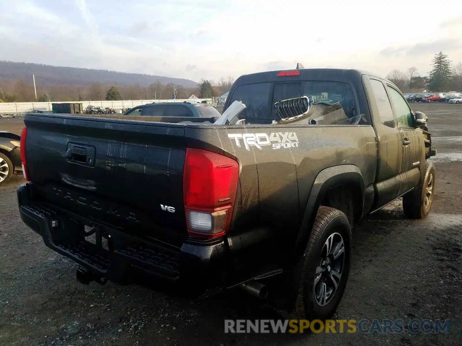 4 Photograph of a damaged car 5TFSZ5ANXKX200156 TOYOTA TACOMA 2019