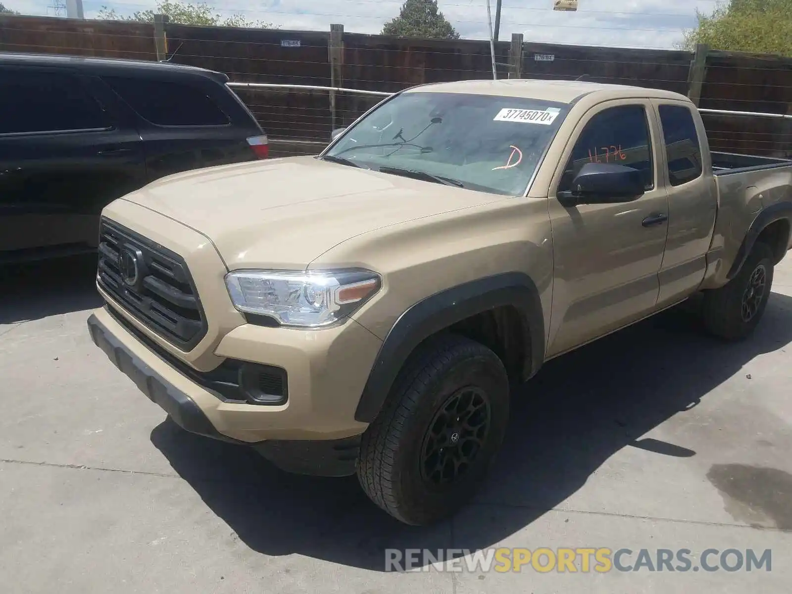 2 Photograph of a damaged car 5TFSZ5ANXKX203851 TOYOTA TACOMA 2019