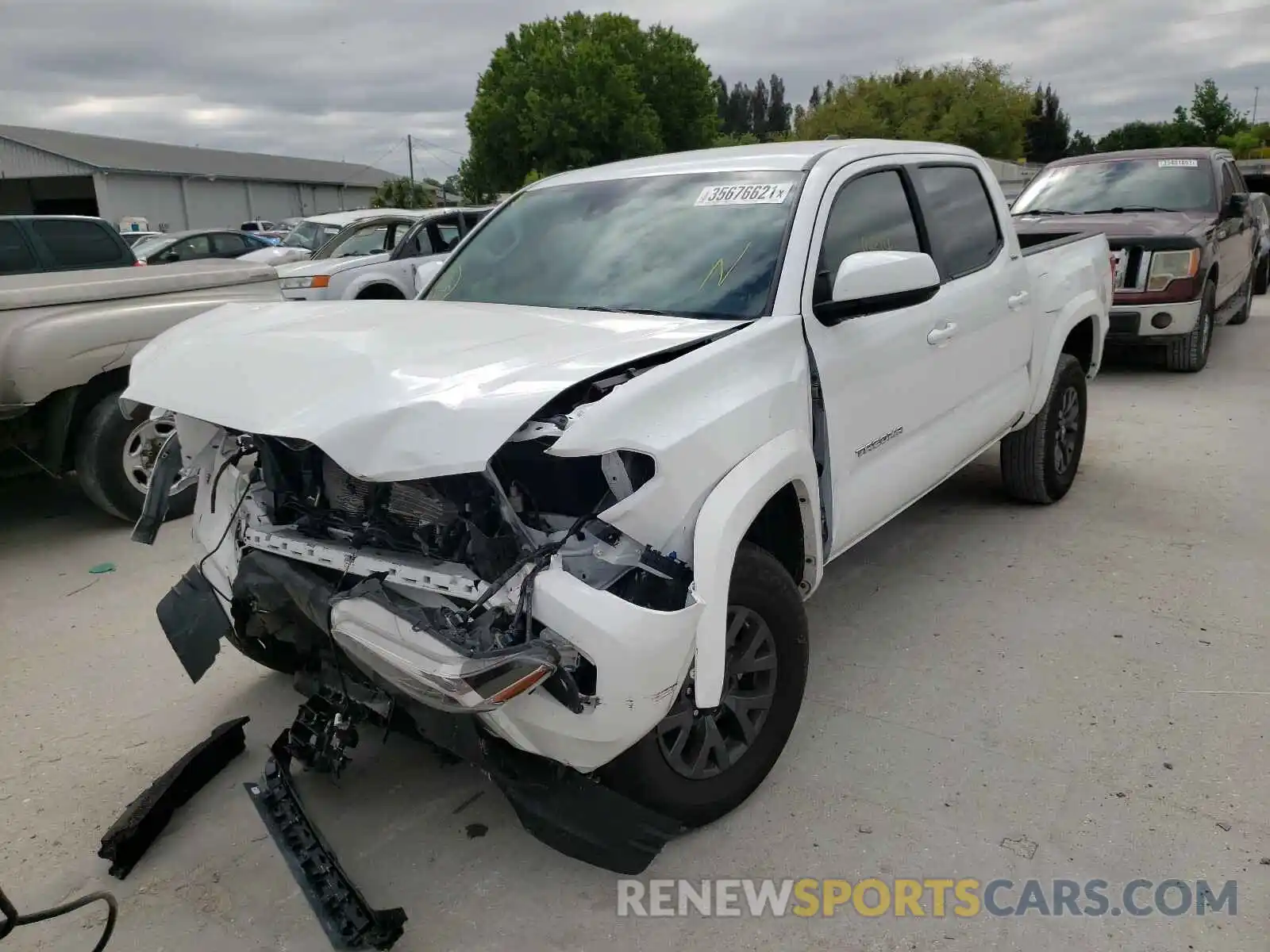 2 Photograph of a damaged car 3TMAZ5CN0LM120459 TOYOTA TACOMA 2020