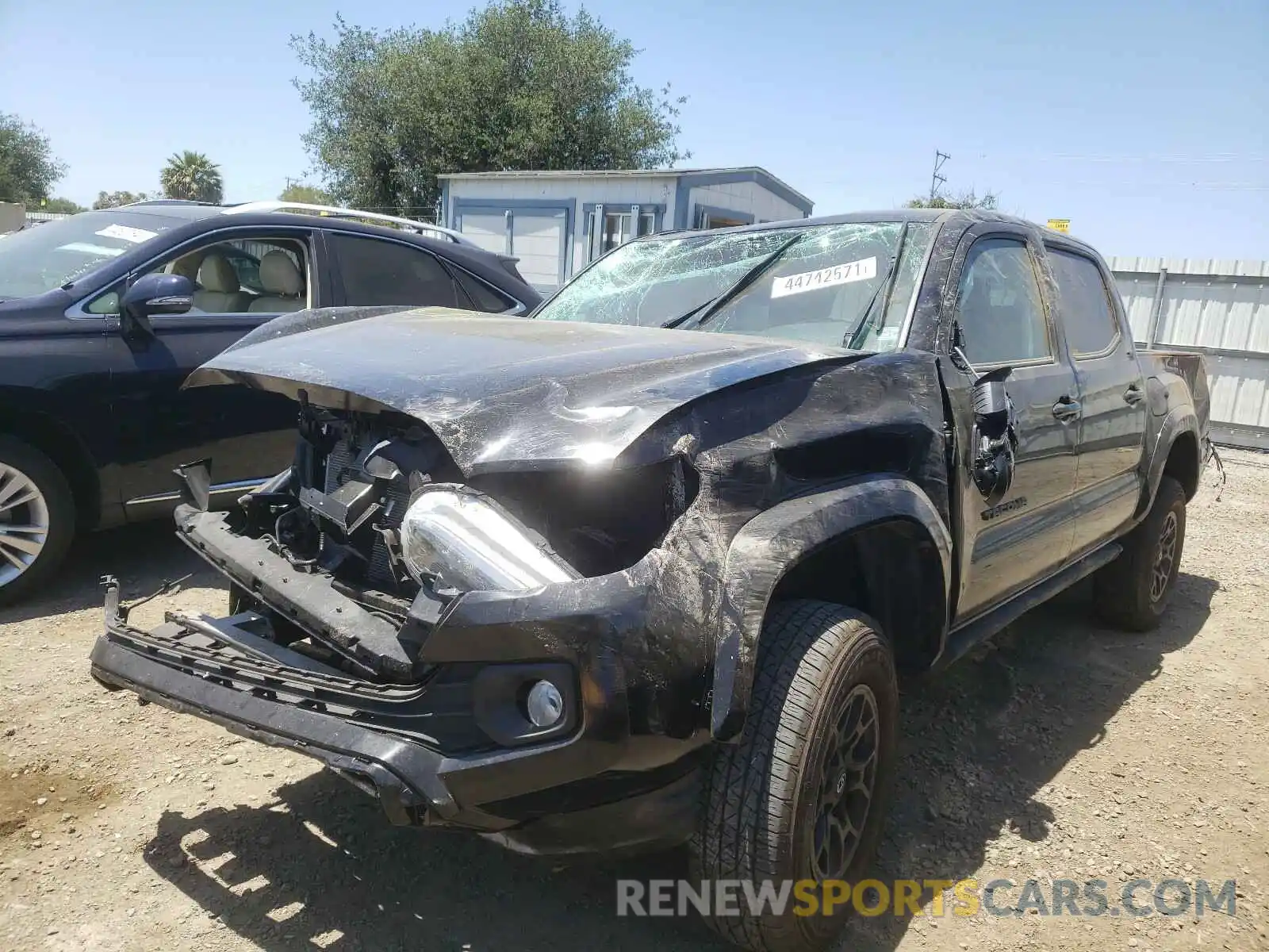 2 Photograph of a damaged car 3TMAZ5CN0LM138069 TOYOTA TACOMA 2020