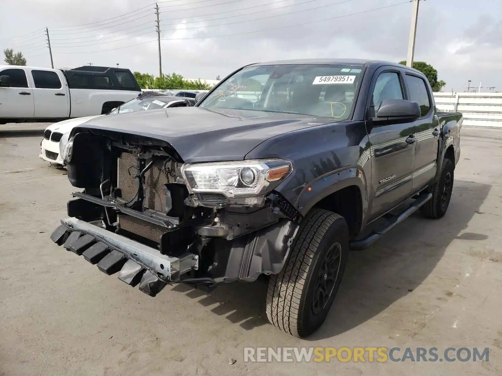 2 Photograph of a damaged car 3TMAZ5CN0LM138394 TOYOTA TACOMA 2020