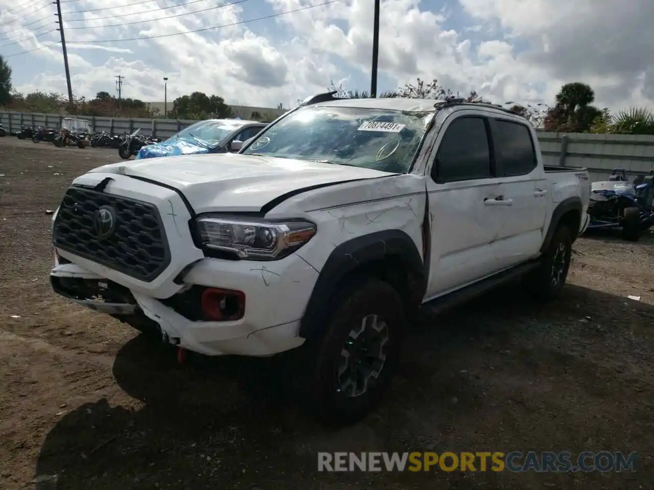 2 Photograph of a damaged car 3TMAZ5CN1LM118204 TOYOTA TACOMA 2020