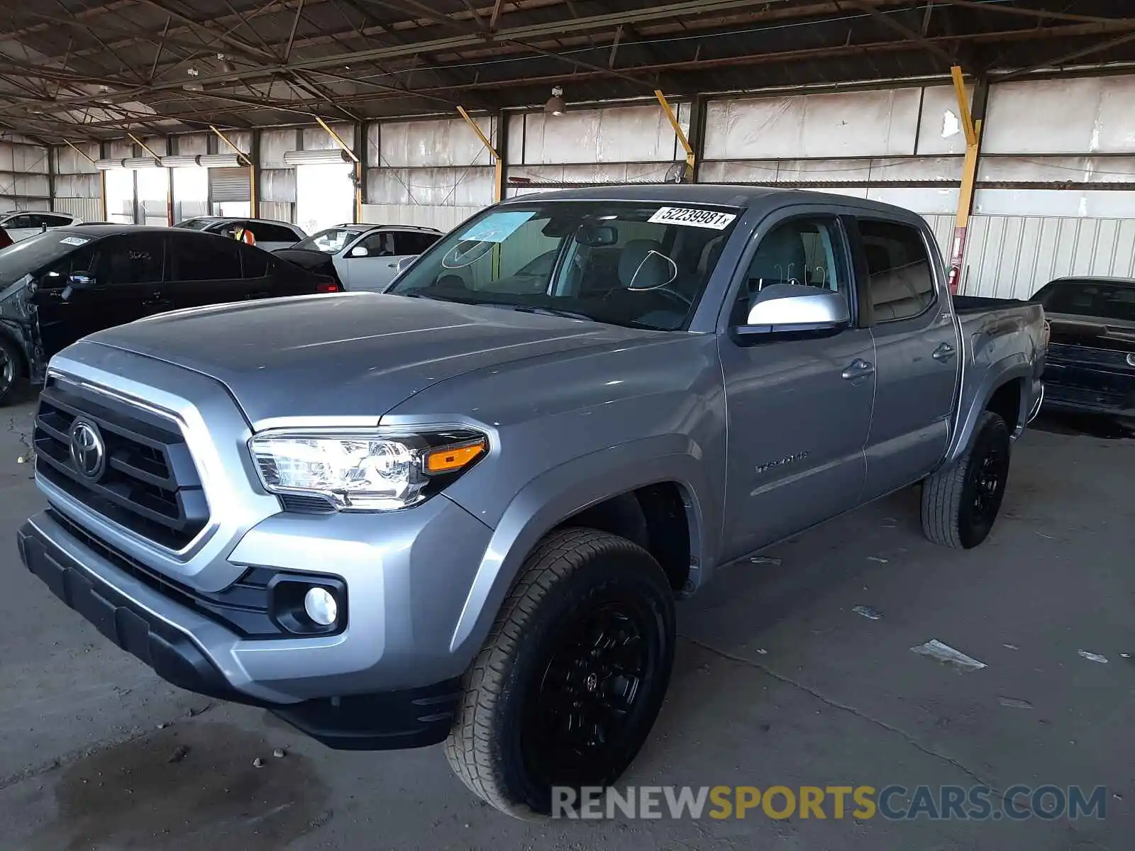 2 Photograph of a damaged car 3TMAZ5CN1LM134659 TOYOTA TACOMA 2020