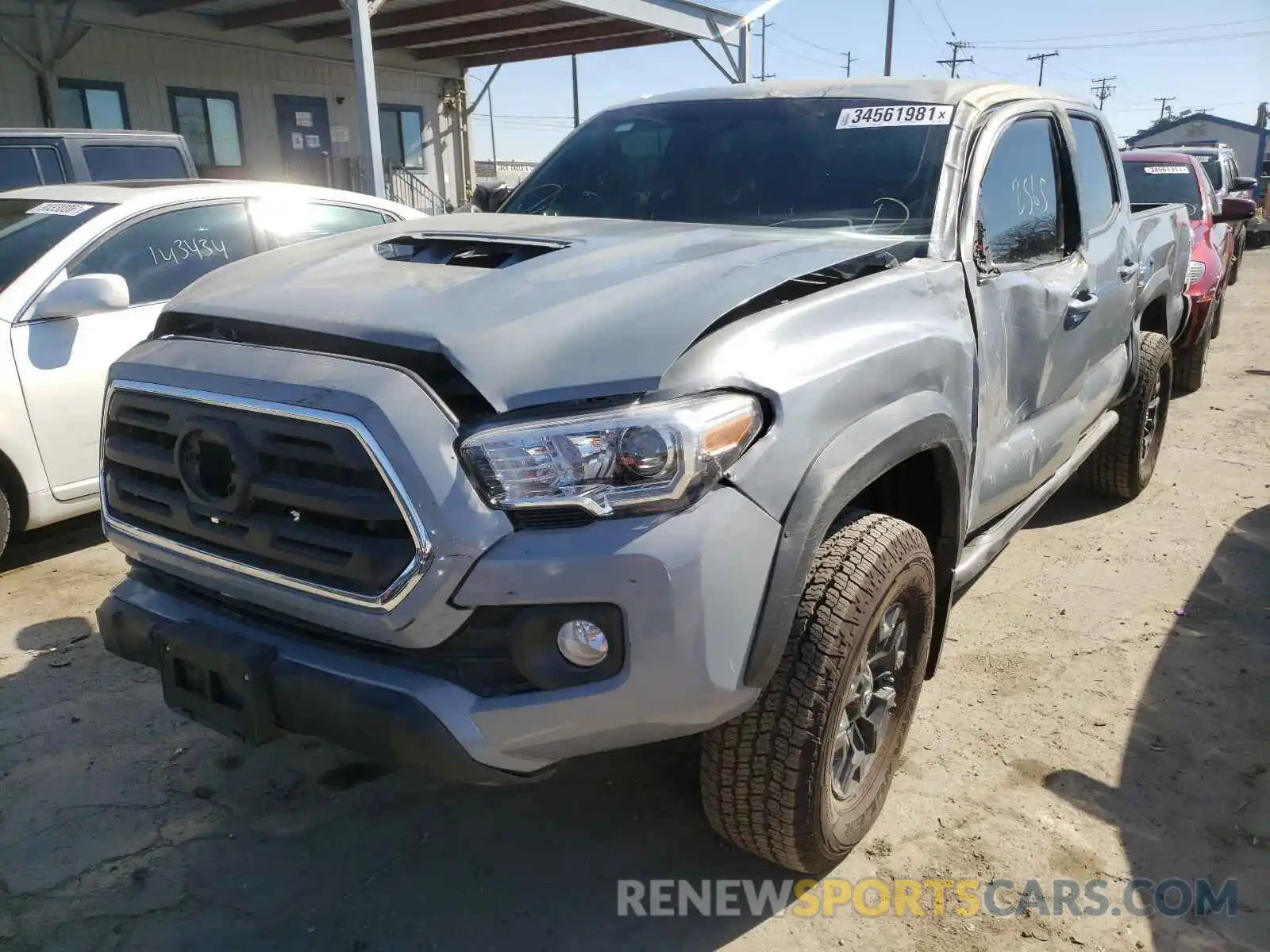 2 Photograph of a damaged car 3TMAZ5CN1LM138985 TOYOTA TACOMA 2020