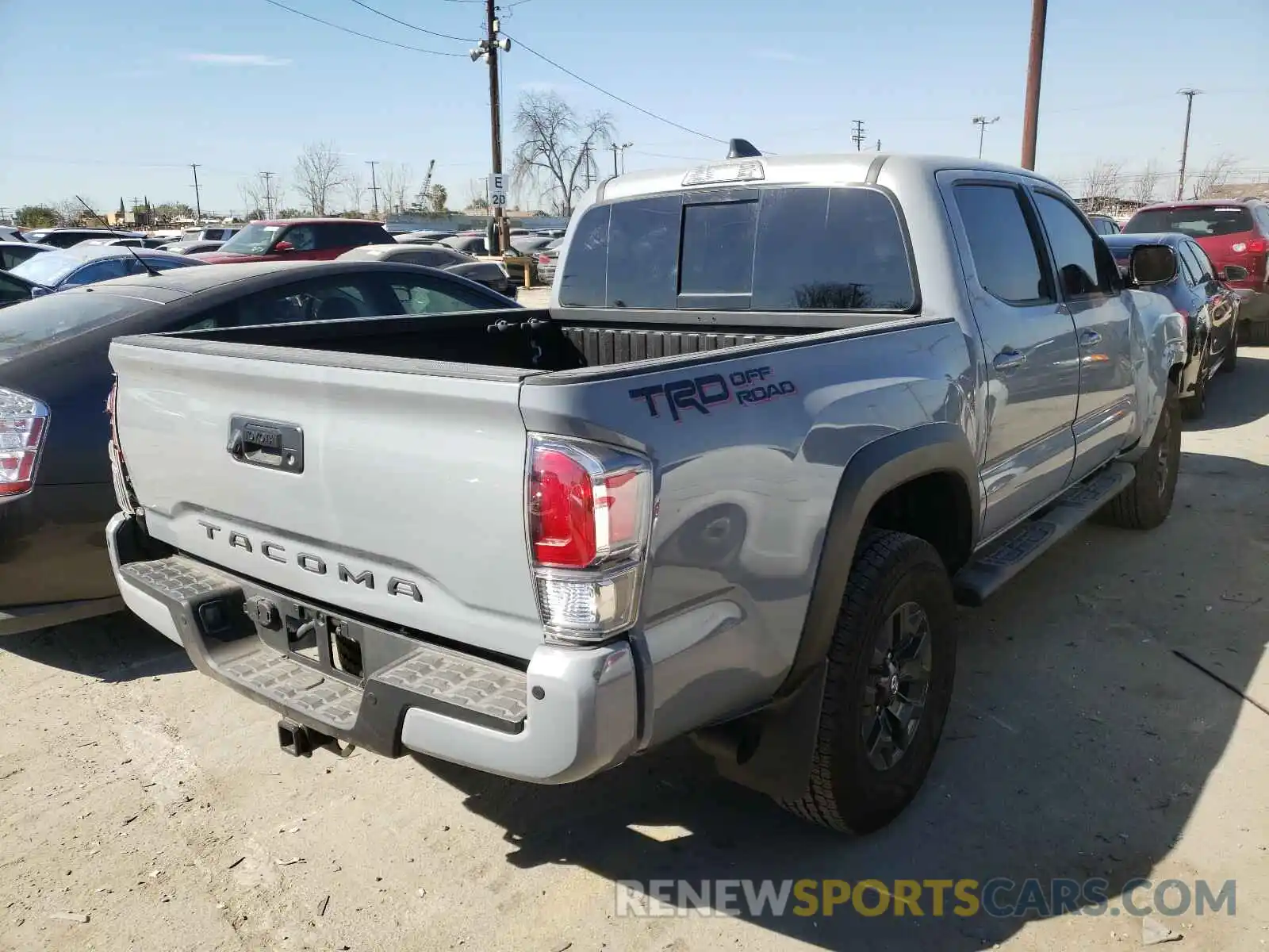 4 Photograph of a damaged car 3TMAZ5CN1LM138985 TOYOTA TACOMA 2020