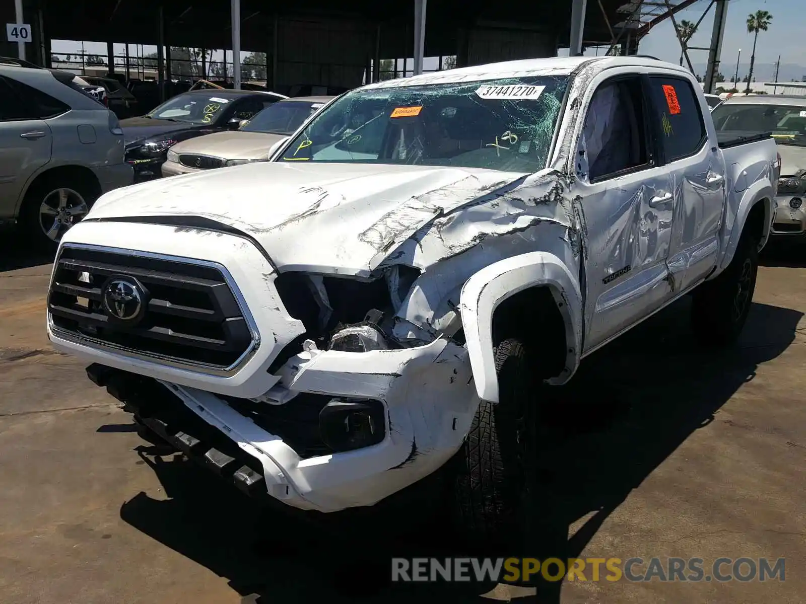 2 Photograph of a damaged car 3TMAZ5CN2LM116199 TOYOTA TACOMA 2020