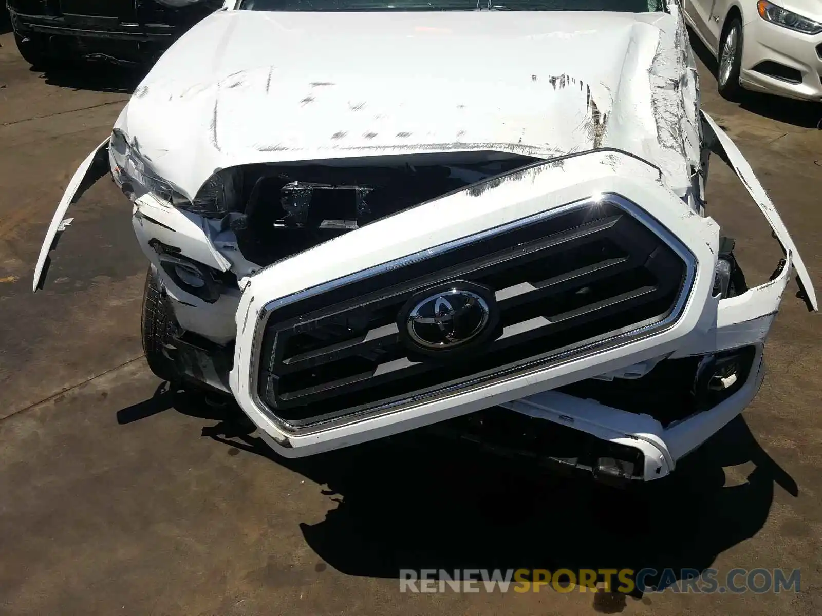 7 Photograph of a damaged car 3TMAZ5CN2LM116199 TOYOTA TACOMA 2020