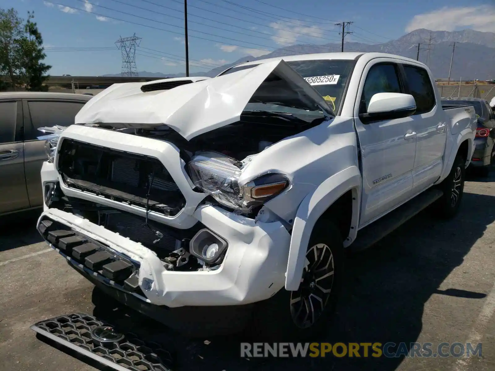 2 Photograph of a damaged car 3TMAZ5CN3LM132203 TOYOTA TACOMA 2020