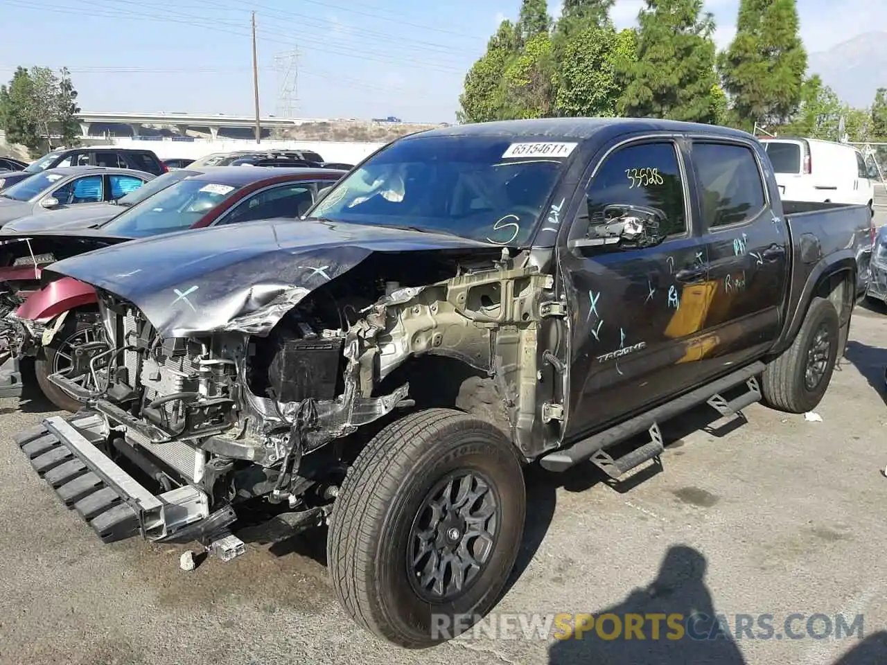 2 Photograph of a damaged car 3TMAZ5CN4LM128337 TOYOTA TACOMA 2020