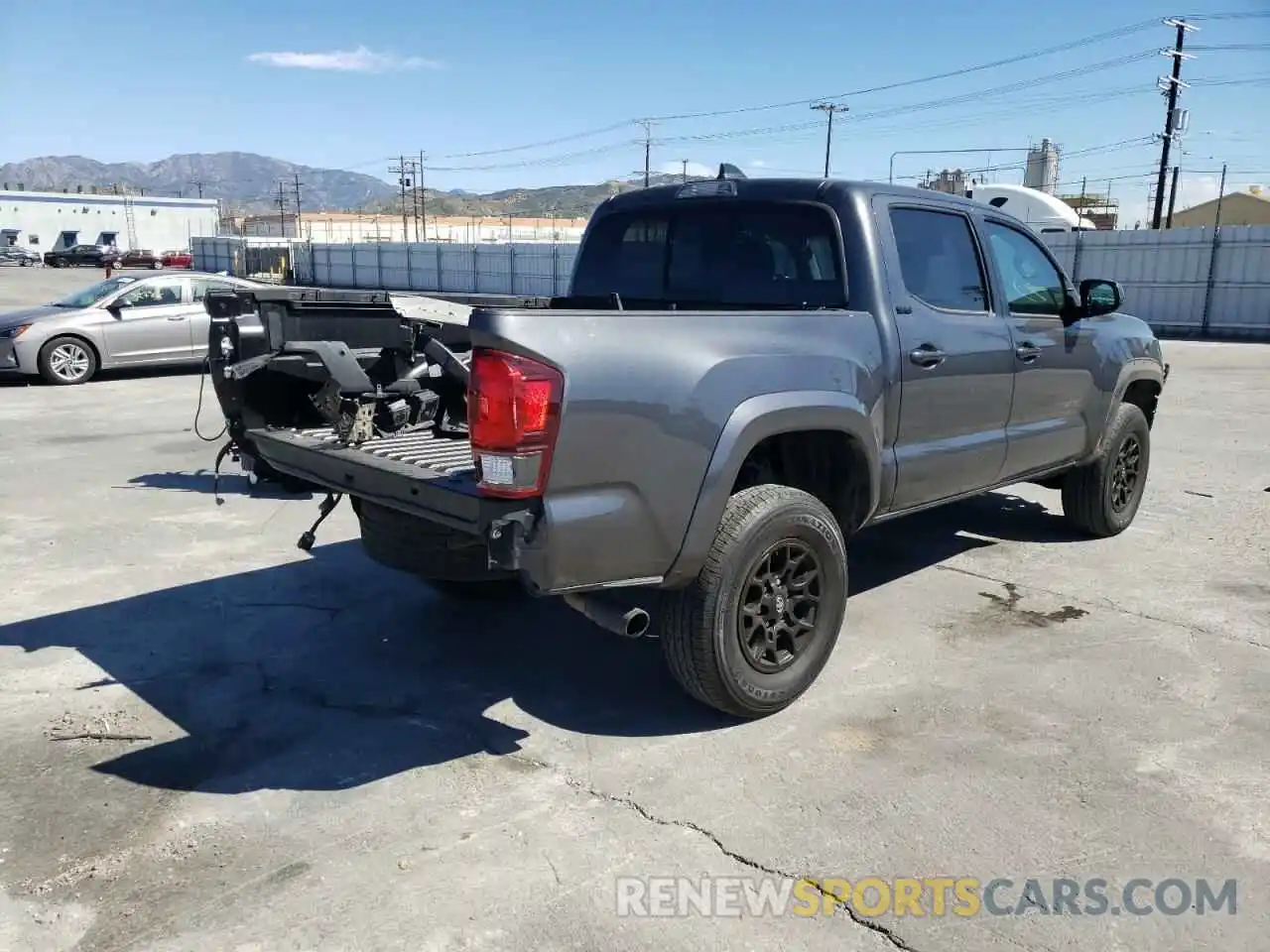 4 Photograph of a damaged car 3TMAZ5CN5LM123602 TOYOTA TACOMA 2020