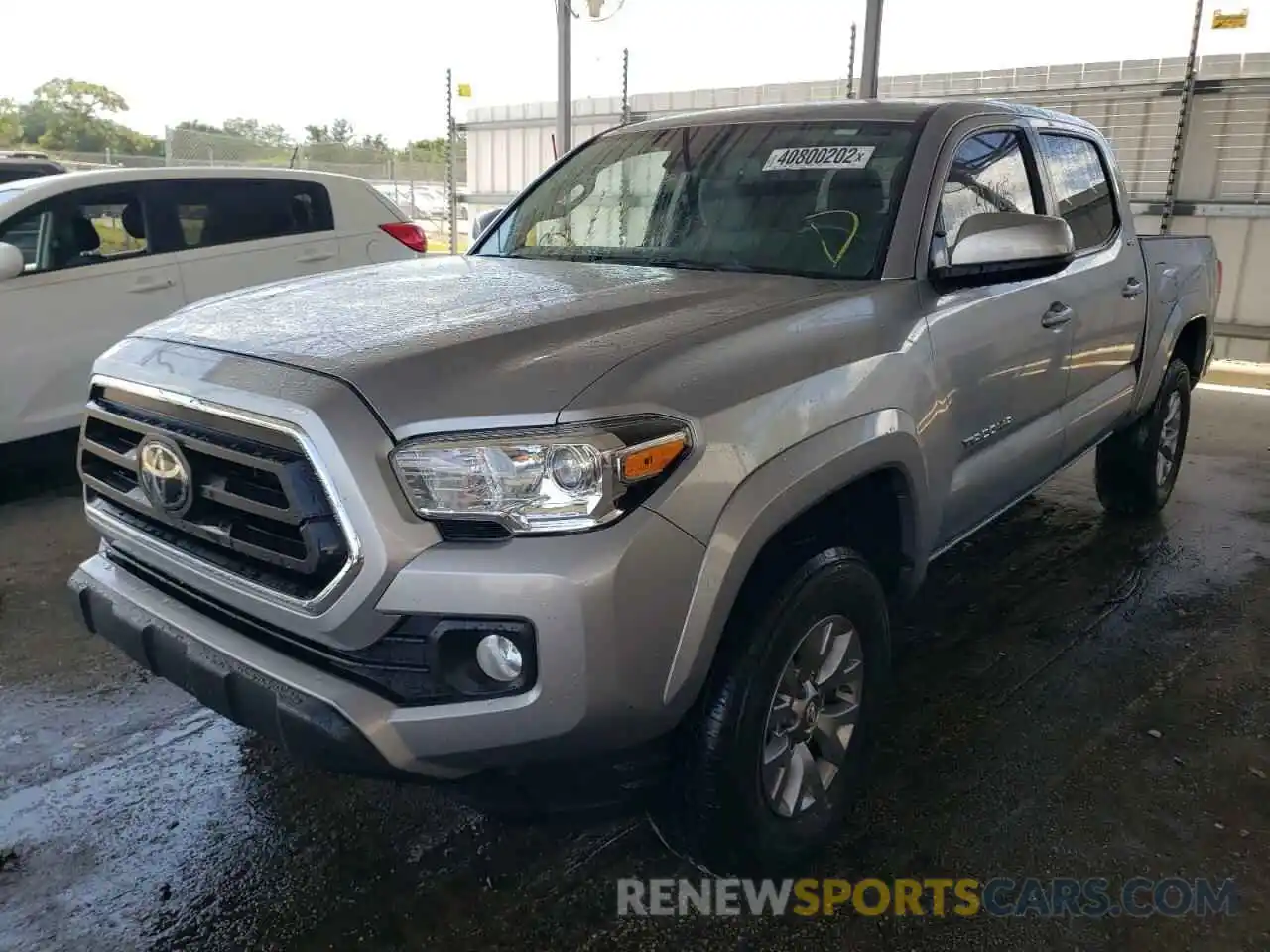 2 Photograph of a damaged car 3TMAZ5CN7LM130891 TOYOTA TACOMA 2020