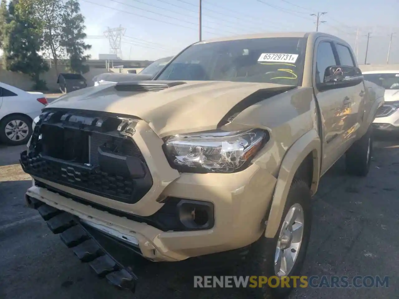 2 Photograph of a damaged car 3TMAZ5CN7LM137887 TOYOTA TACOMA 2020