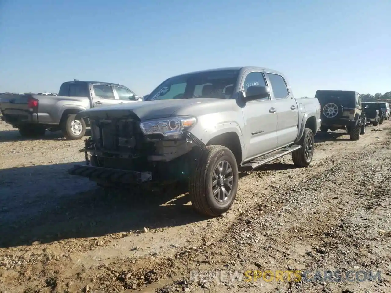 2 Photograph of a damaged car 3TMAZ5CN9LM124476 TOYOTA TACOMA 2020