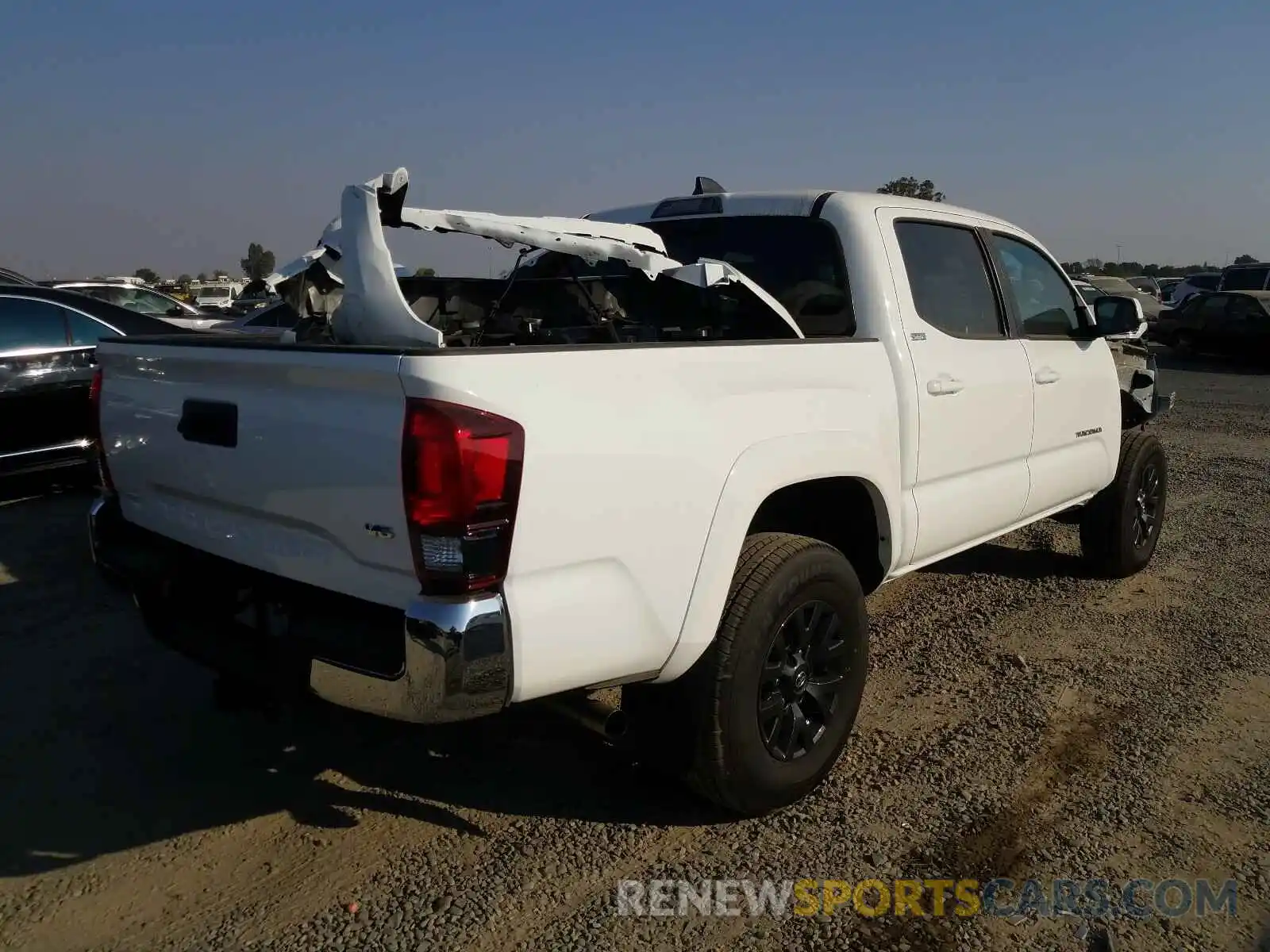 4 Photograph of a damaged car 3TMAZ5CNXLM133249 TOYOTA TACOMA 2020