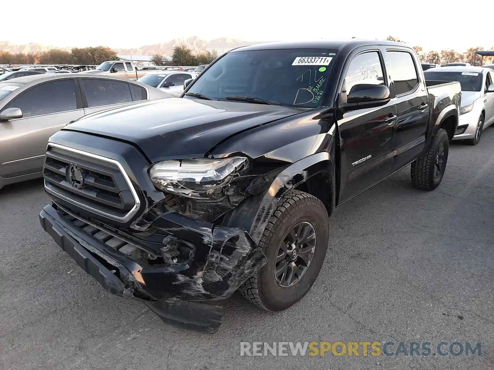 2 Photograph of a damaged car 3TMAZ5CNXLM138306 TOYOTA TACOMA 2020