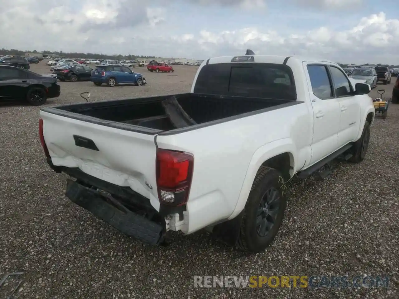 4 Photograph of a damaged car 3TMBZ5DN0LM024303 TOYOTA TACOMA 2020