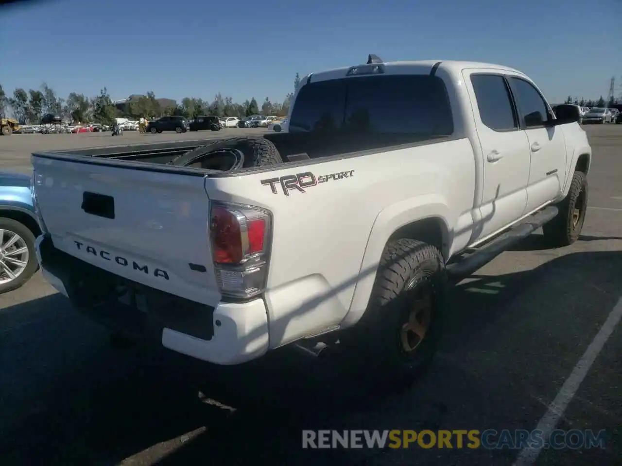 4 Photograph of a damaged car 3TMBZ5DN0LM025869 TOYOTA TACOMA 2020