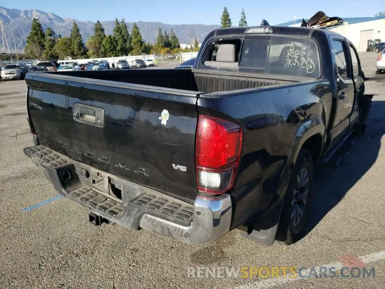 4 Photograph of a damaged car 3TMBZ5DN3LM023999 TOYOTA TACOMA 2020