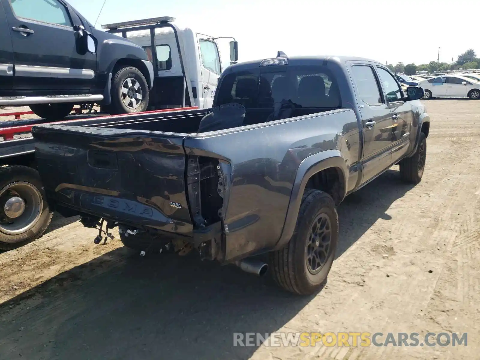 4 Photograph of a damaged car 3TMBZ5DN8LM024386 TOYOTA TACOMA 2020