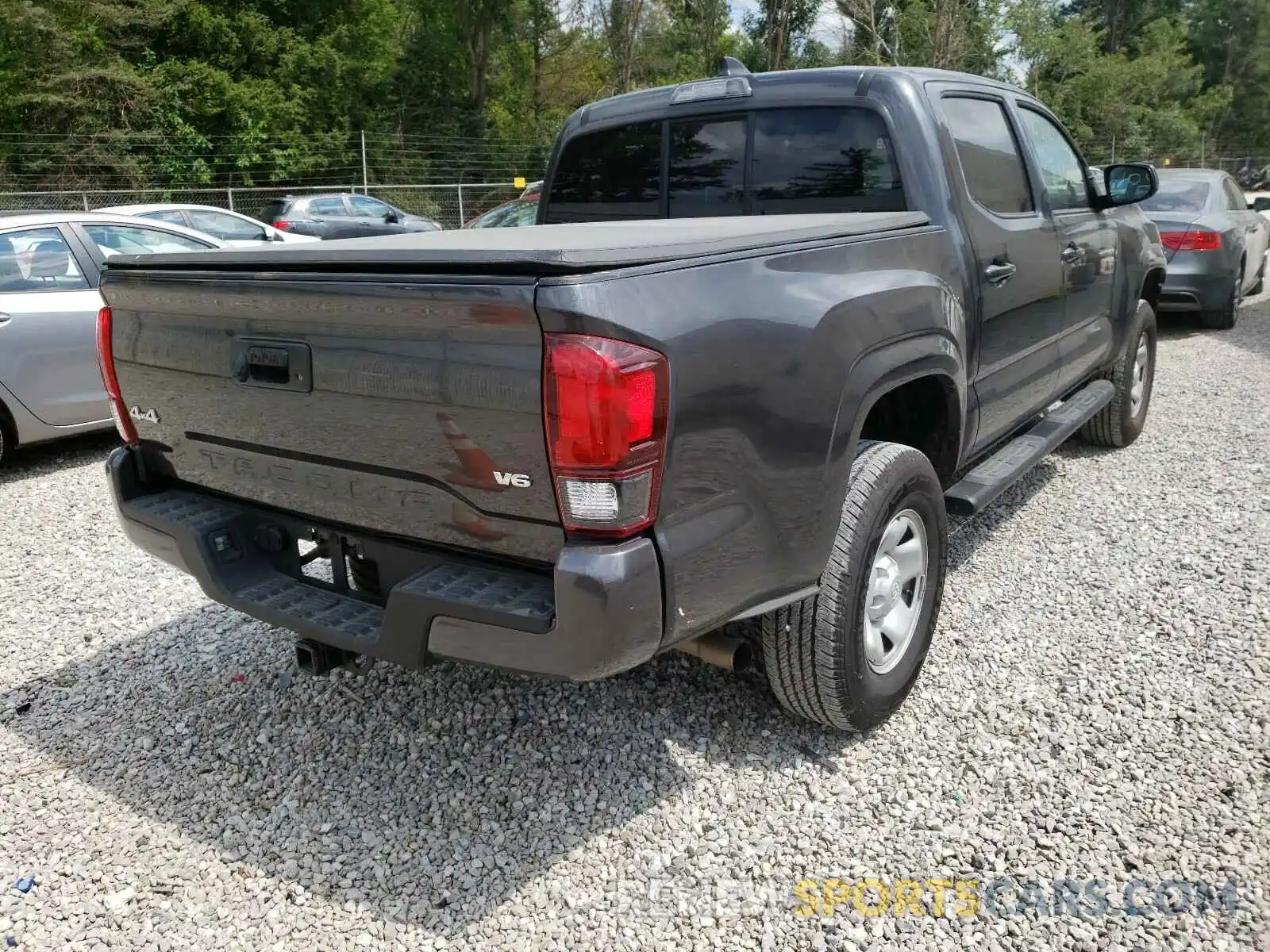 4 Photograph of a damaged car 3TMCZ5AN0LM307986 TOYOTA TACOMA 2020