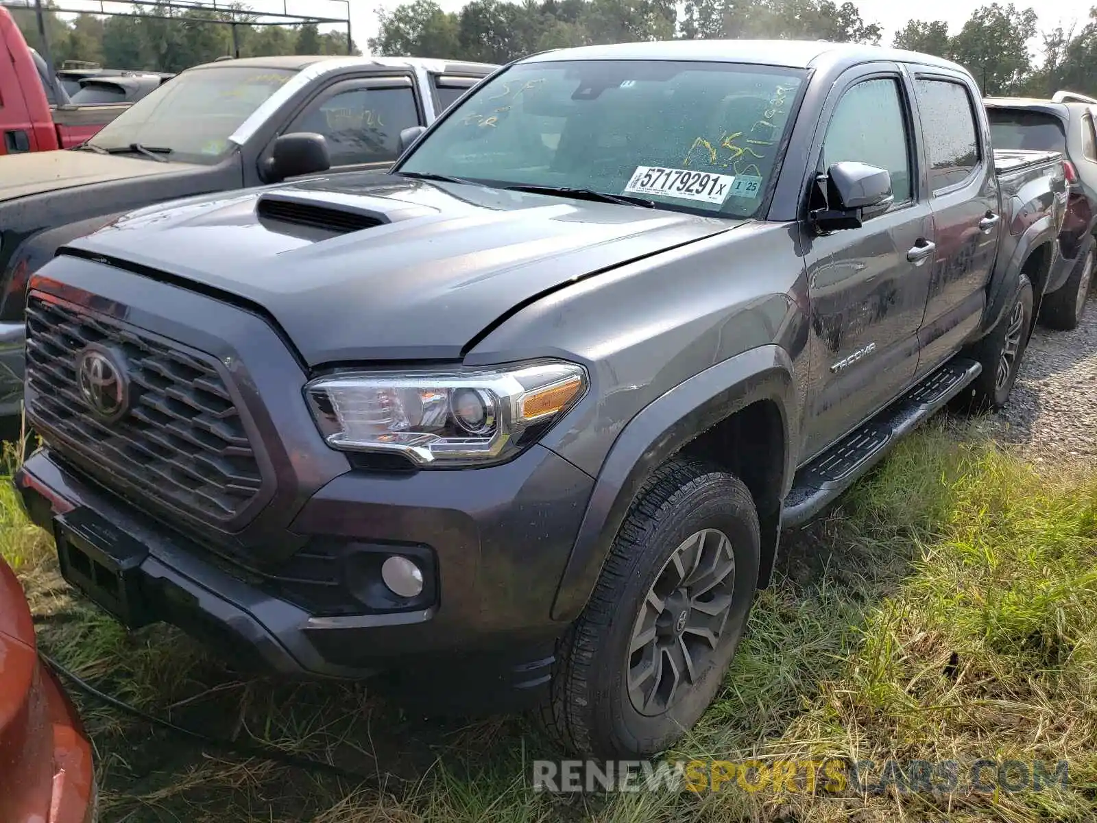 2 Photograph of a damaged car 3TMCZ5AN0LM310371 TOYOTA TACOMA 2020