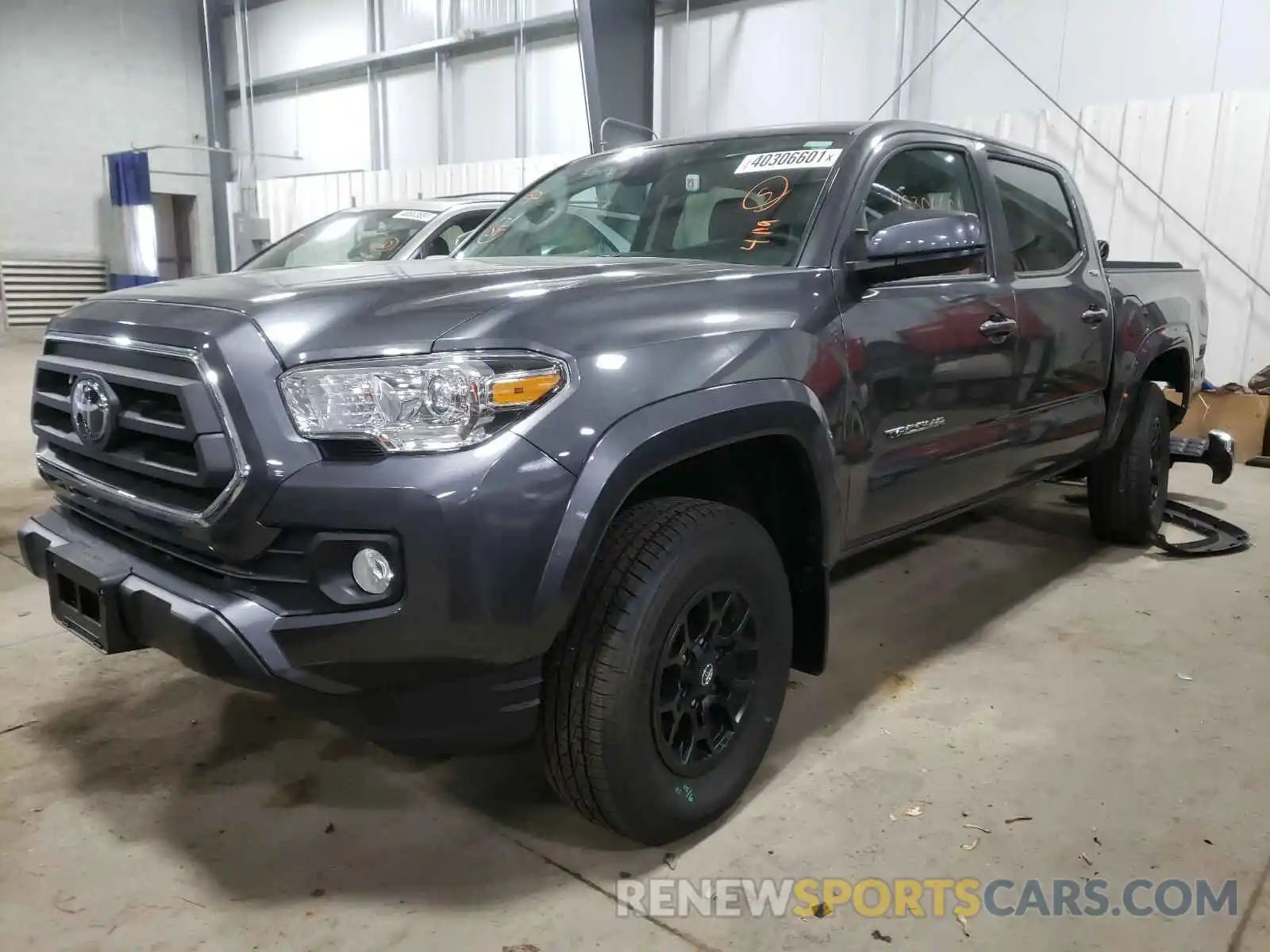 2 Photograph of a damaged car 3TMCZ5AN0LM317031 TOYOTA TACOMA 2020