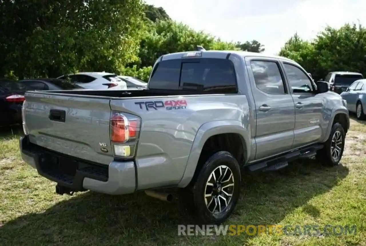 4 Photograph of a damaged car 3TMCZ5AN1LM329611 TOYOTA TACOMA 2020