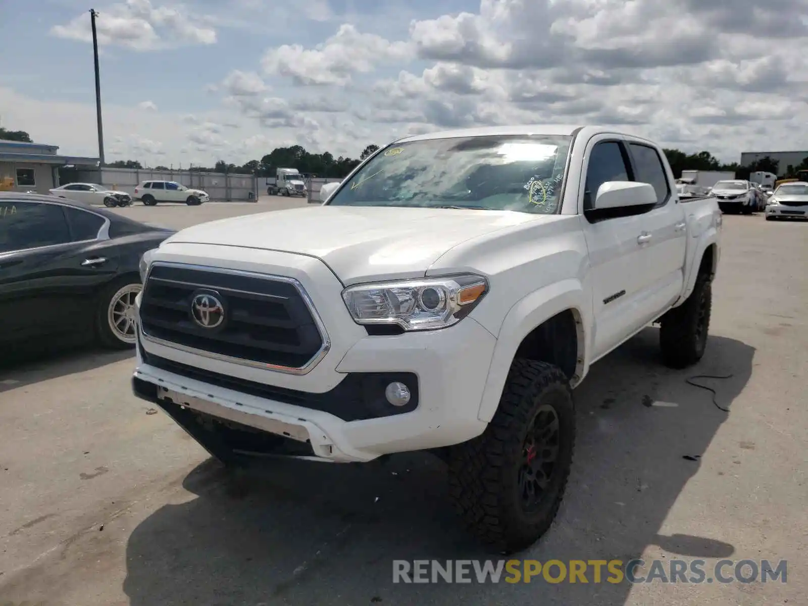 2 Photograph of a damaged car 3TMCZ5AN1LM351351 TOYOTA TACOMA 2020