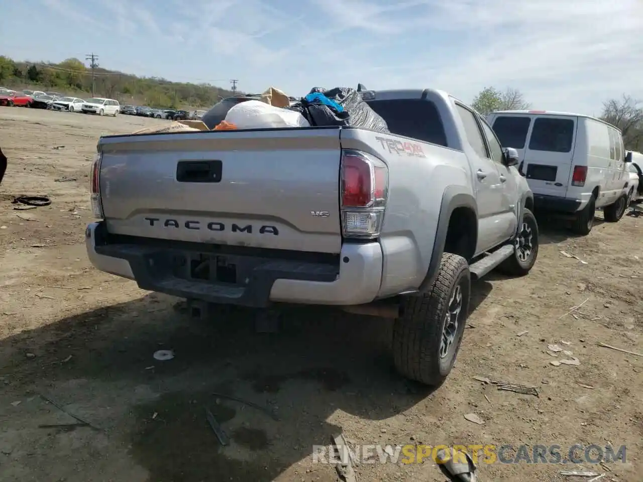 4 Photograph of a damaged car 3TMCZ5AN1LM365721 TOYOTA TACOMA 2020