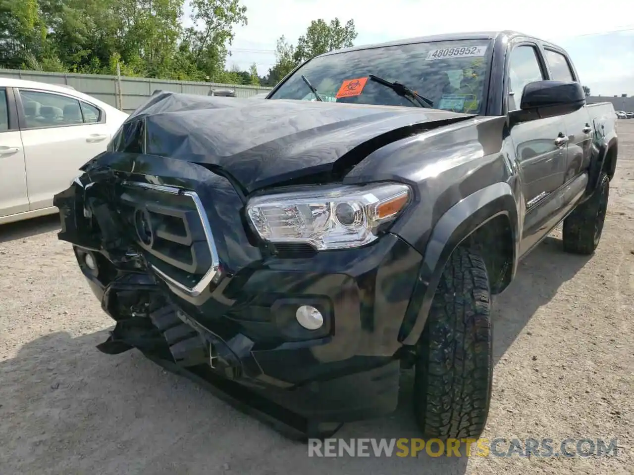 2 Photograph of a damaged car 3TMCZ5AN2LM306712 TOYOTA TACOMA 2020