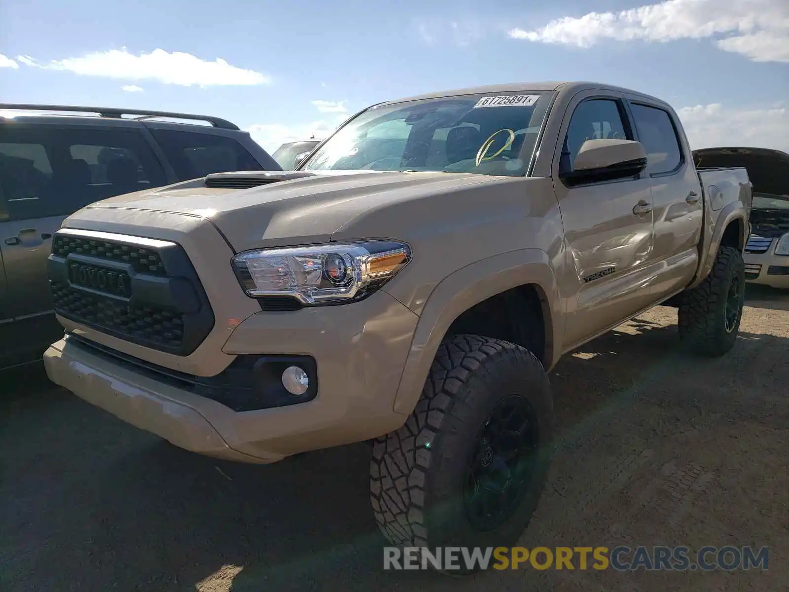 2 Photograph of a damaged car 3TMCZ5AN2LM310274 TOYOTA TACOMA 2020