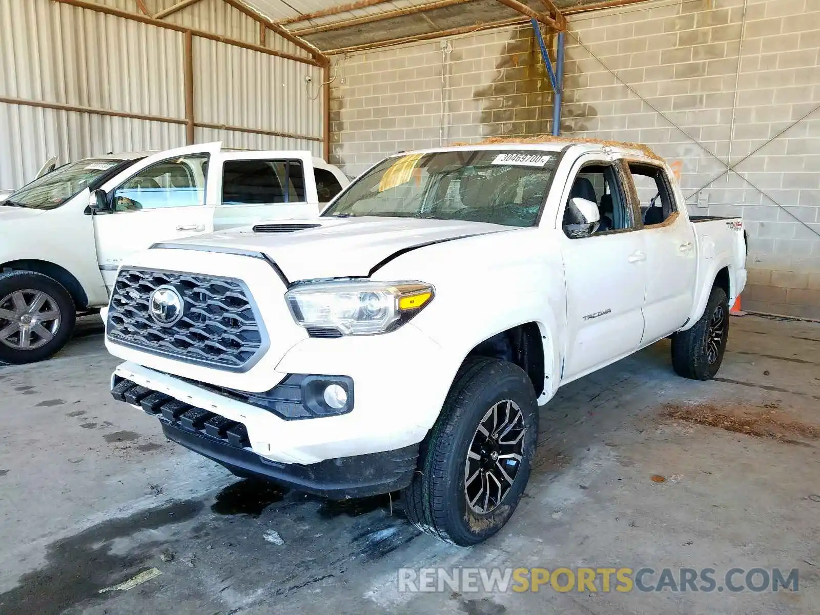 2 Photograph of a damaged car 3TMCZ5AN2LM323428 TOYOTA TACOMA 2020