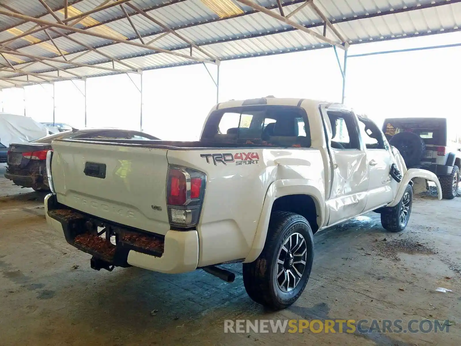 4 Photograph of a damaged car 3TMCZ5AN2LM323428 TOYOTA TACOMA 2020