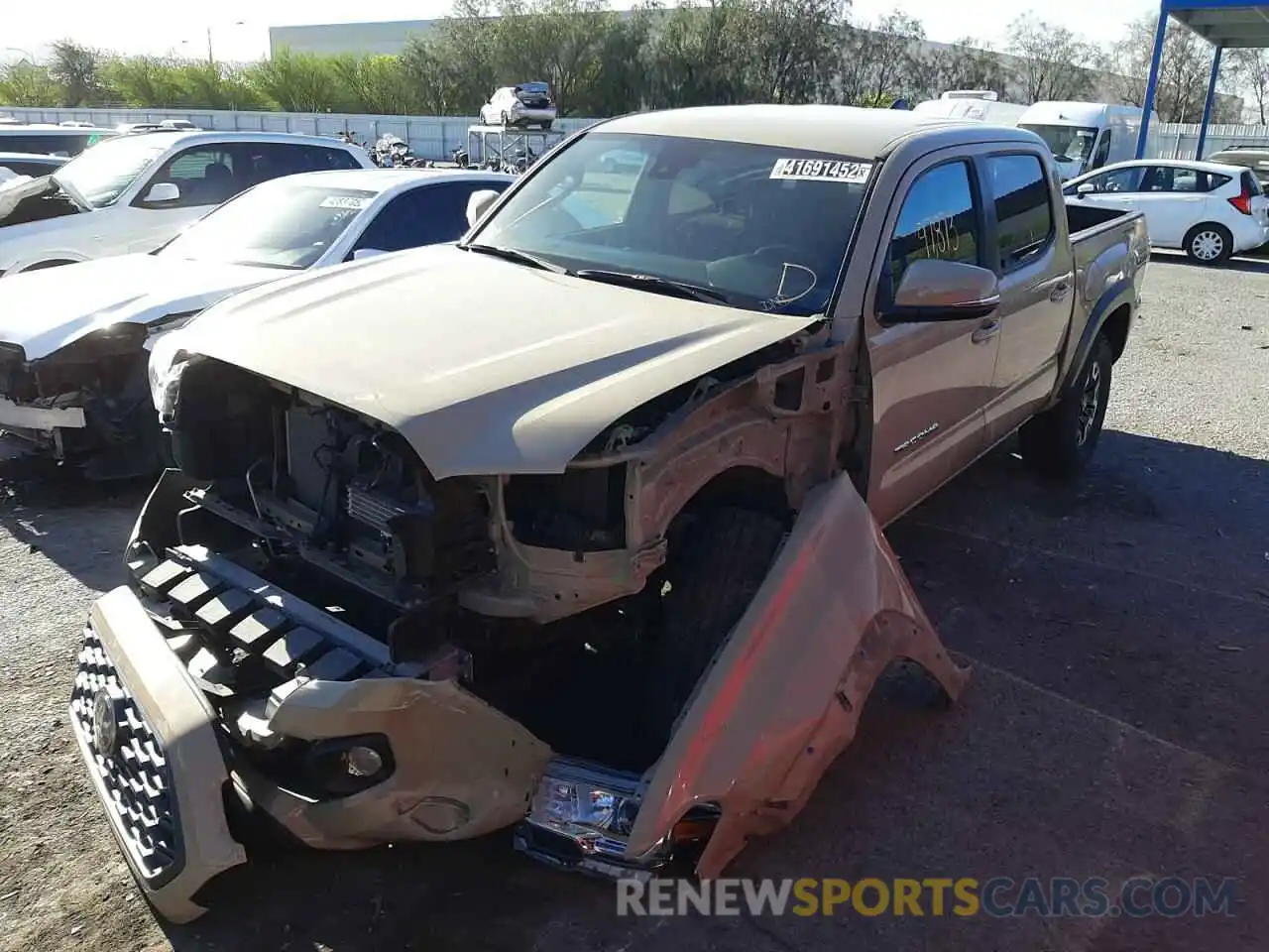 2 Photograph of a damaged car 3TMCZ5AN2LM334249 TOYOTA TACOMA 2020