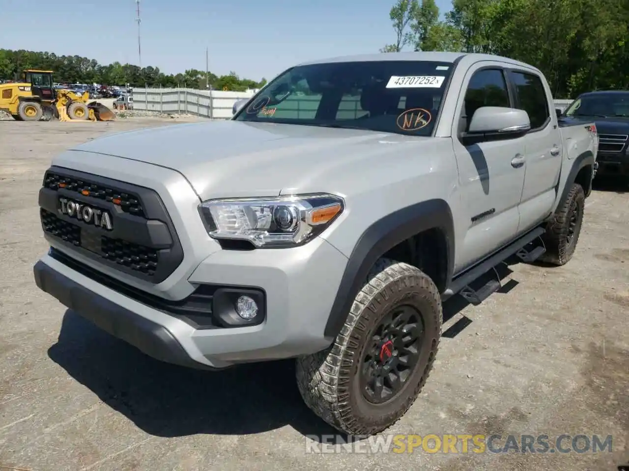 2 Photograph of a damaged car 3TMCZ5AN3LM308713 TOYOTA TACOMA 2020