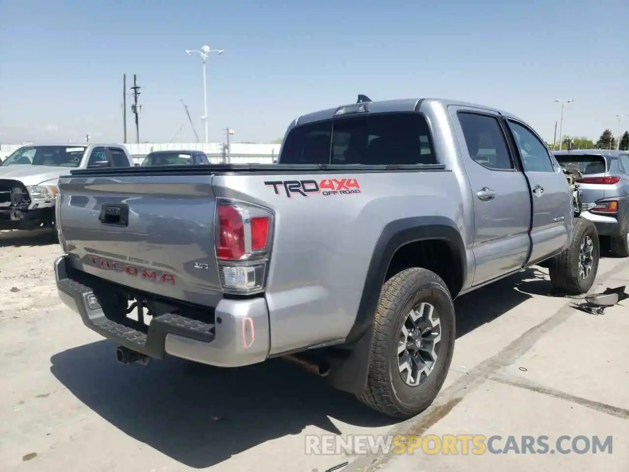 4 Photograph of a damaged car 3TMCZ5AN3LM311207 TOYOTA TACOMA 2020