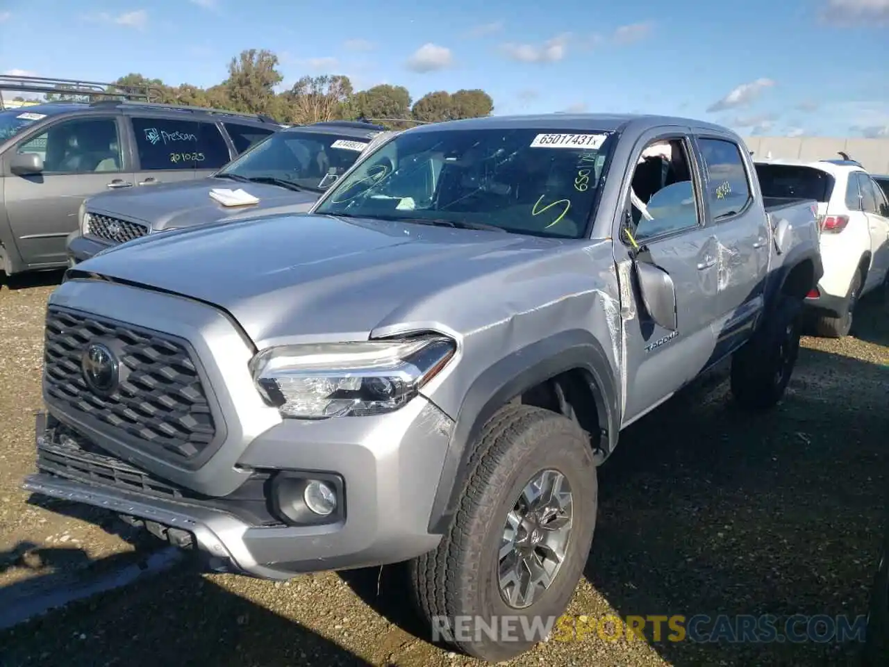 2 Photograph of a damaged car 3TMCZ5AN3LM332252 TOYOTA TACOMA 2020