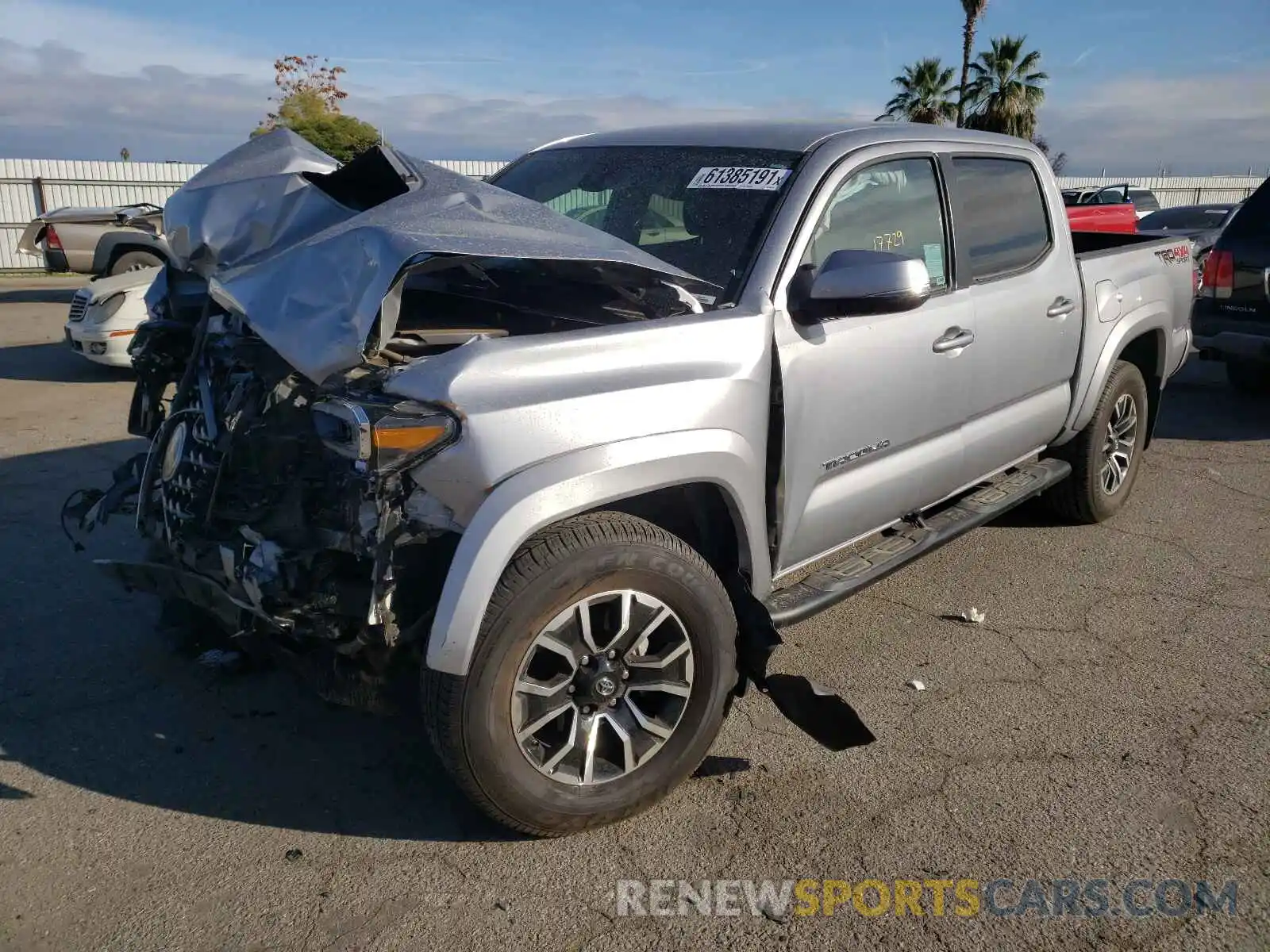 2 Photograph of a damaged car 3TMCZ5AN4LM305383 TOYOTA TACOMA 2020