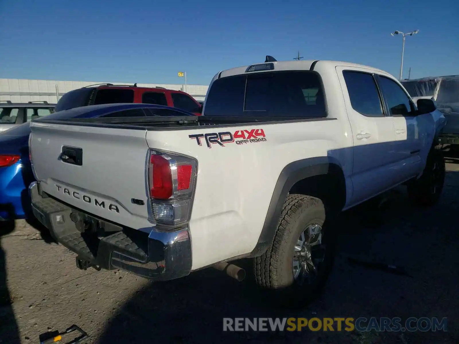 4 Photograph of a damaged car 3TMCZ5AN4LM312818 TOYOTA TACOMA 2020