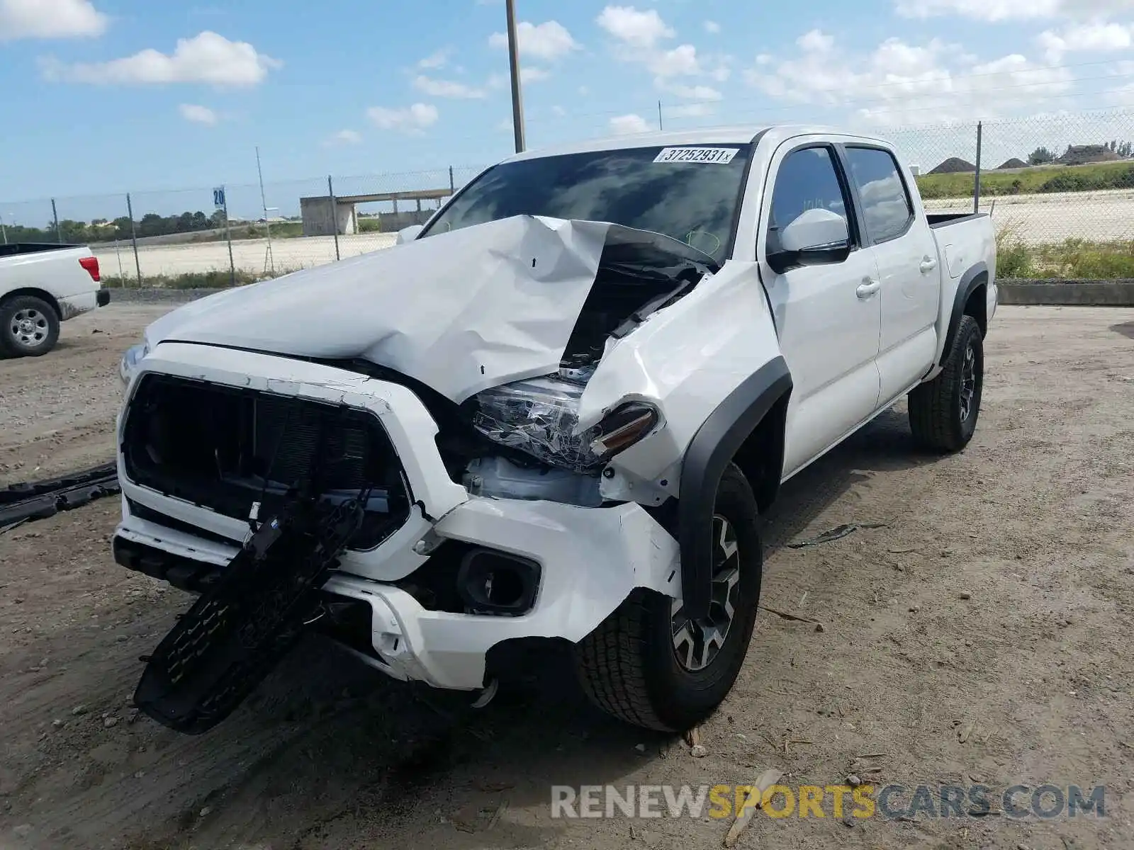 2 Photograph of a damaged car 3TMCZ5AN5LM311970 TOYOTA TACOMA 2020