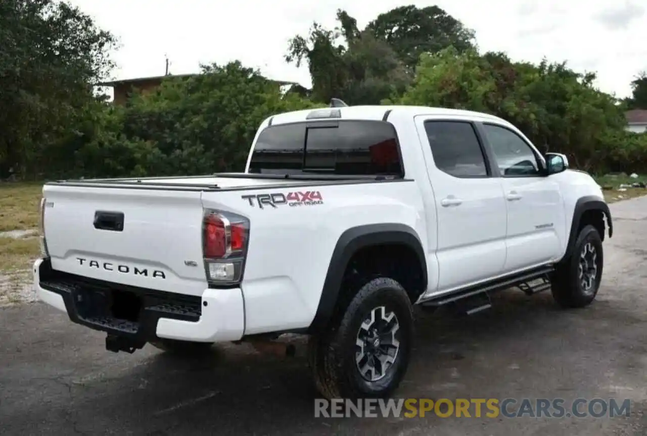 4 Photograph of a damaged car 3TMCZ5AN5LM314612 TOYOTA TACOMA 2020